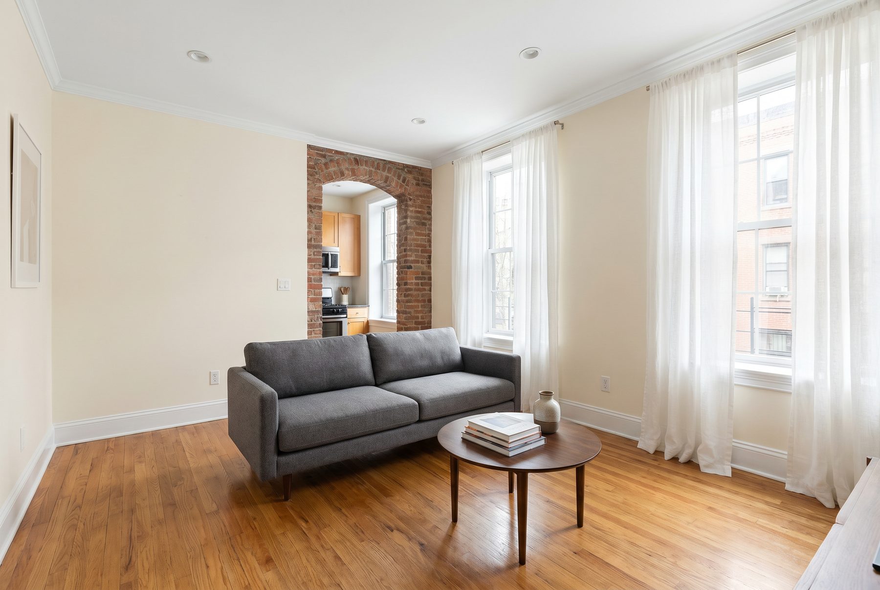 Restored, freshly painted living room with natural light